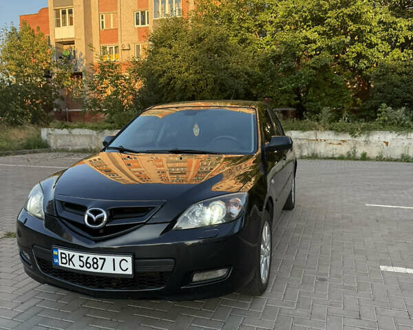 Черный Мазда 3, объемом двигателя 1.6 л и пробегом 211 тыс. км за 5999 $, фото 1 на Automoto.ua