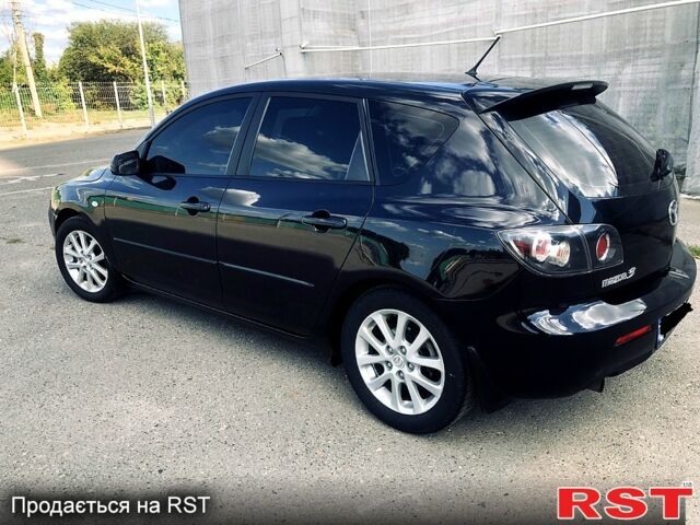 Чорний Мазда 3, об'ємом двигуна 1.6 л та пробігом 191 тис. км за 6500 $, фото 4 на Automoto.ua