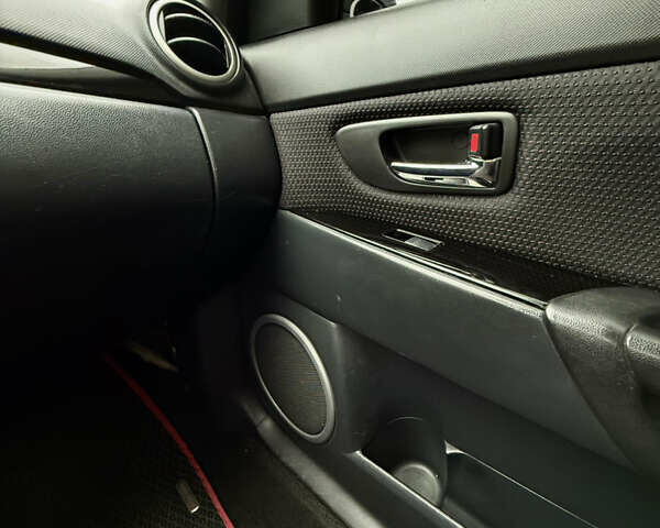 Черный Мазда 3, объемом двигателя 2 л и пробегом 274 тыс. км за 6800 $, фото 22 на Automoto.ua