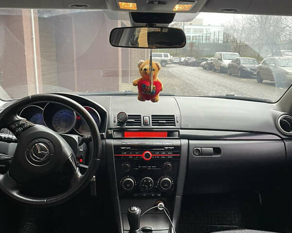 Черный Мазда 3, объемом двигателя 1.6 л и пробегом 210 тыс. км за 5200 $, фото 8 на Automoto.ua