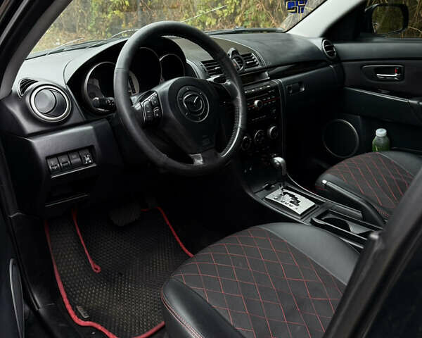 Черный Мазда 3, объемом двигателя 2 л и пробегом 274 тыс. км за 6800 $, фото 18 на Automoto.ua