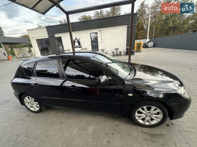 Чорний Мазда 3, об'ємом двигуна 1.6 л та пробігом 215 тис. км за 5500 $, фото 4 на Automoto.ua