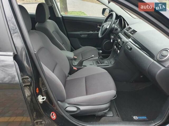 Черный Мазда 3, объемом двигателя 1.6 л и пробегом 264 тыс. км за 5700 $, фото 18 на Automoto.ua