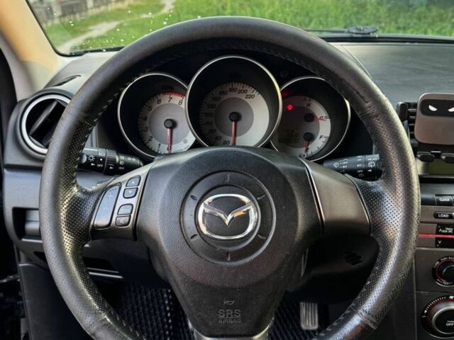 Черный Мазда 3, объемом двигателя 1.6 л и пробегом 240 тыс. км за 5300 $, фото 6 на Automoto.ua