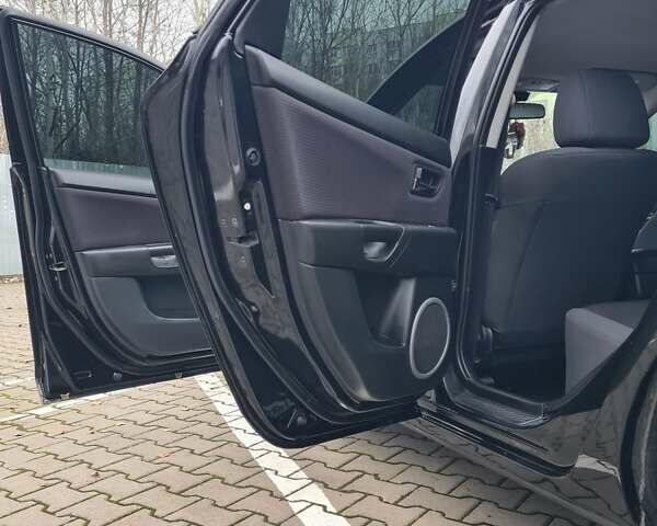 Черный Мазда 3, объемом двигателя 1.6 л и пробегом 182 тыс. км за 5500 $, фото 16 на Automoto.ua