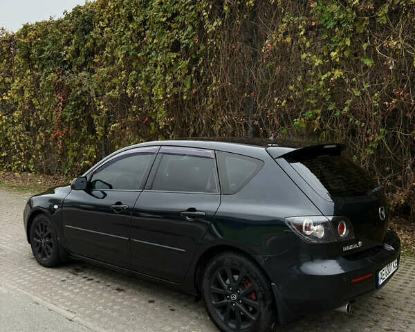 Черный Мазда 3, объемом двигателя 2 л и пробегом 274 тыс. км за 6800 $, фото 12 на Automoto.ua