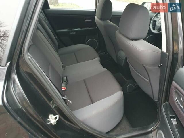 Черный Мазда 3, объемом двигателя 1.6 л и пробегом 264 тыс. км за 5700 $, фото 16 на Automoto.ua