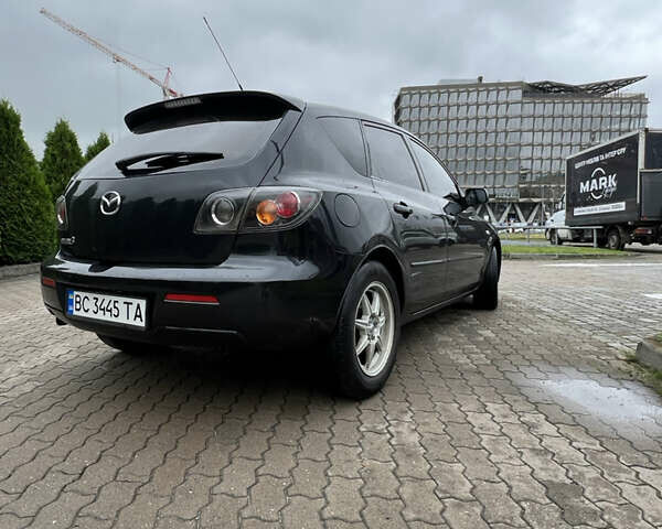 Черный Мазда 3, объемом двигателя 1.6 л и пробегом 235 тыс. км за 5200 $, фото 3 на Automoto.ua