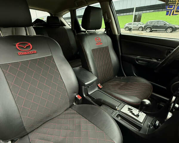 Черный Мазда 3, объемом двигателя 2 л и пробегом 274 тыс. км за 6800 $, фото 28 на Automoto.ua