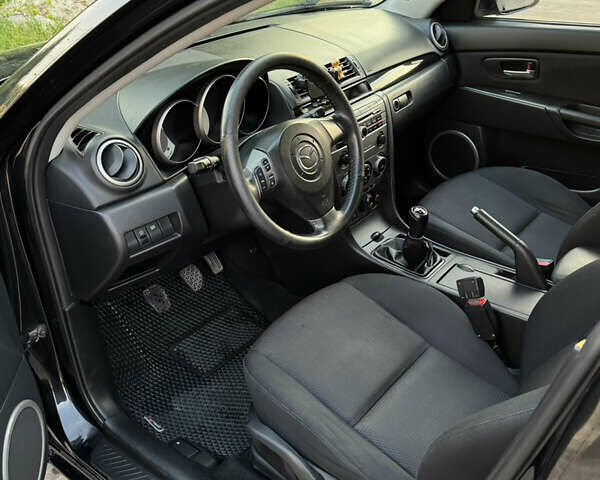 Черный Мазда 3, объемом двигателя 1.6 л и пробегом 240 тыс. км за 6200 $, фото 9 на Automoto.ua