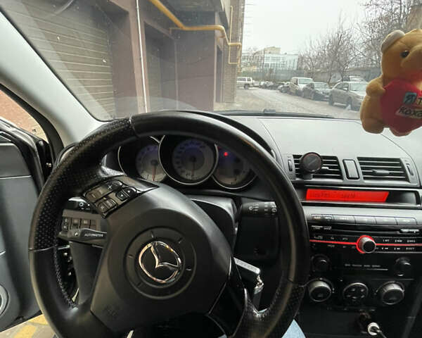 Черный Мазда 3, объемом двигателя 1.6 л и пробегом 210 тыс. км за 5200 $, фото 16 на Automoto.ua