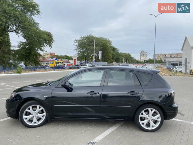 Черный Мазда 3, объемом двигателя 2 л и пробегом 200 тыс. км за 5750 $, фото 3 на Automoto.ua