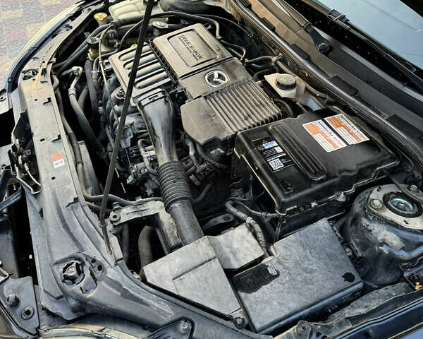 Черный Мазда 3, объемом двигателя 1.6 л и пробегом 240 тыс. км за 6200 $, фото 16 на Automoto.ua