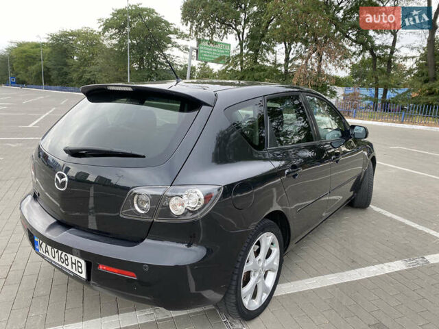Черный Мазда 3, объемом двигателя 2 л и пробегом 200 тыс. км за 5750 $, фото 5 на Automoto.ua