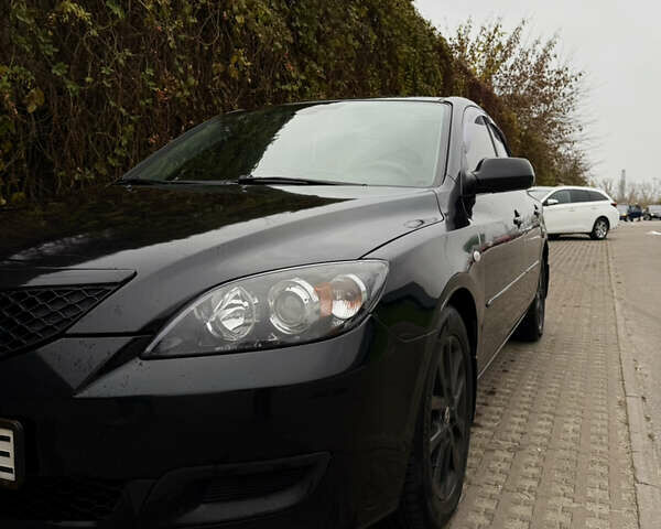 Черный Мазда 3, объемом двигателя 2 л и пробегом 274 тыс. км за 6800 $, фото 5 на Automoto.ua