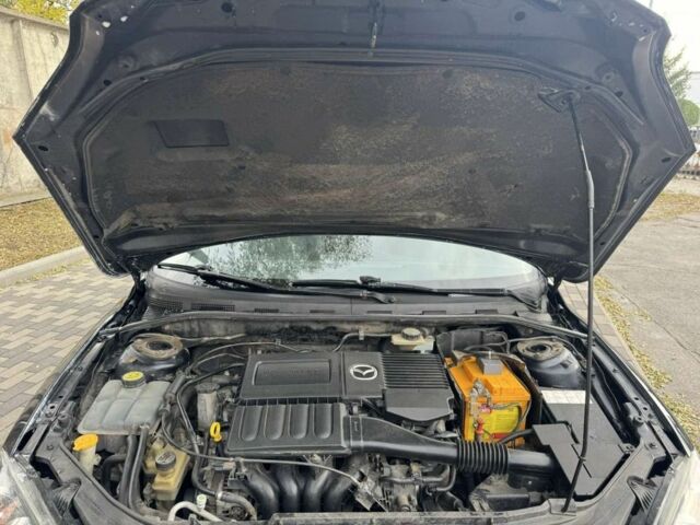 Черный Мазда 3, объемом двигателя 1.6 л и пробегом 215 тыс. км за 5850 $, фото 8 на Automoto.ua