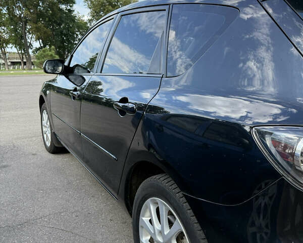 Черный Мазда 3, объемом двигателя 1.6 л и пробегом 211 тыс. км за 5999 $, фото 6 на Automoto.ua