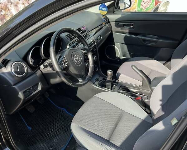 Черный Мазда 3, объемом двигателя 1.6 л и пробегом 204 тыс. км за 5500 $, фото 16 на Automoto.ua