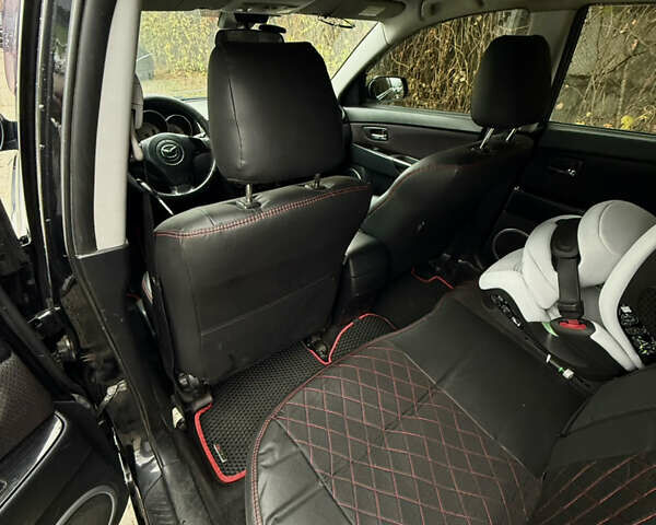 Черный Мазда 3, объемом двигателя 2 л и пробегом 274 тыс. км за 6800 $, фото 31 на Automoto.ua