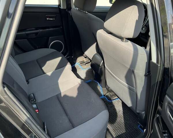 Черный Мазда 3, объемом двигателя 1.6 л и пробегом 204 тыс. км за 5500 $, фото 11 на Automoto.ua