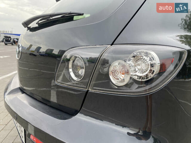 Черный Мазда 3, объемом двигателя 2 л и пробегом 200 тыс. км за 5750 $, фото 27 на Automoto.ua