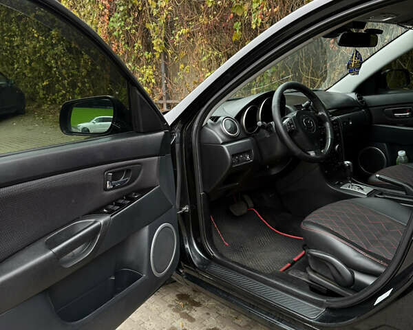 Черный Мазда 3, объемом двигателя 2 л и пробегом 274 тыс. км за 6800 $, фото 17 на Automoto.ua