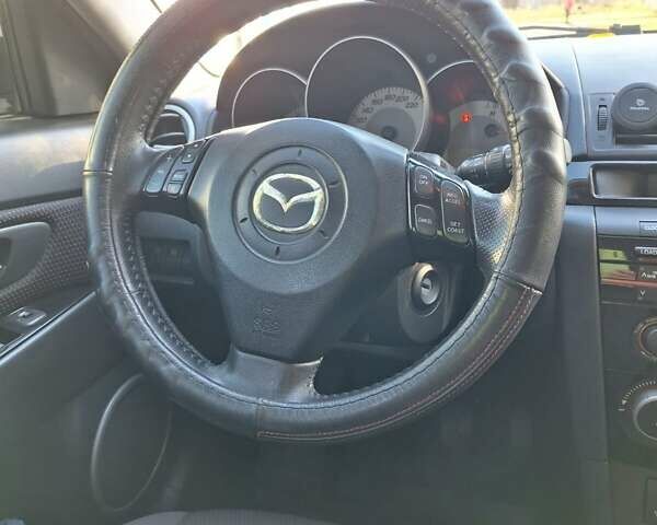 Черный Мазда 3, объемом двигателя 2 л и пробегом 198 тыс. км за 6200 $, фото 3 на Automoto.ua