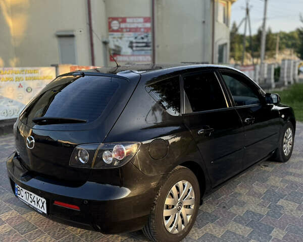 Черный Мазда 3, объемом двигателя 1.6 л и пробегом 240 тыс. км за 6200 $, фото 4 на Automoto.ua
