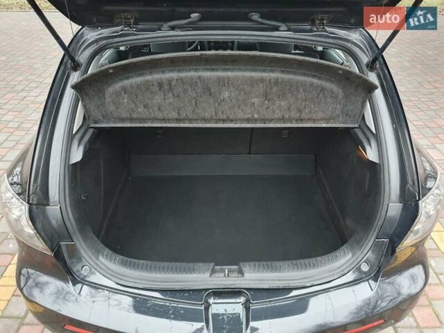 Черный Мазда 3, объемом двигателя 1.6 л и пробегом 264 тыс. км за 5700 $, фото 20 на Automoto.ua