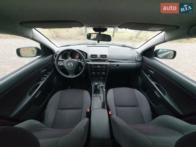Черный Мазда 3, объемом двигателя 1.6 л и пробегом 264 тыс. км за 5700 $, фото 8 на Automoto.ua