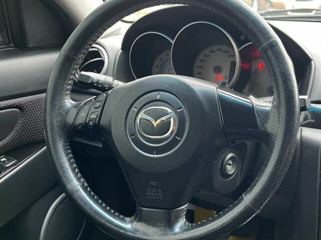 Черный Мазда 3, объемом двигателя 1.6 л и пробегом 265 тыс. км за 5800 $, фото 12 на Automoto.ua