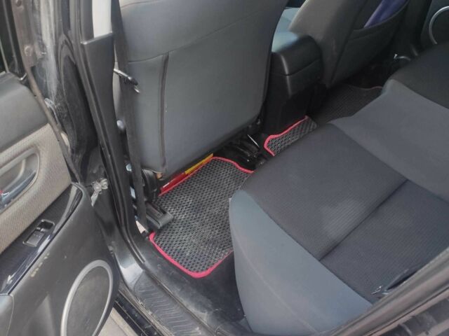 Черный Мазда 3, объемом двигателя 2 л и пробегом 298 тыс. км за 4600 $, фото 8 на Automoto.ua