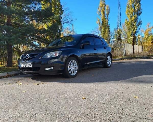 Черный Мазда 3, объемом двигателя 2 л и пробегом 198 тыс. км за 6200 $, фото 12 на Automoto.ua