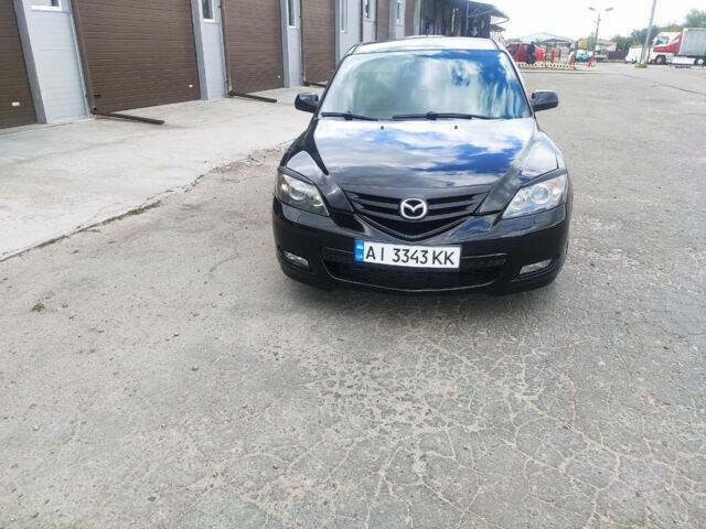 Черный Мазда 3, объемом двигателя 2 л и пробегом 298 тыс. км за 4600 $, фото 12 на Automoto.ua