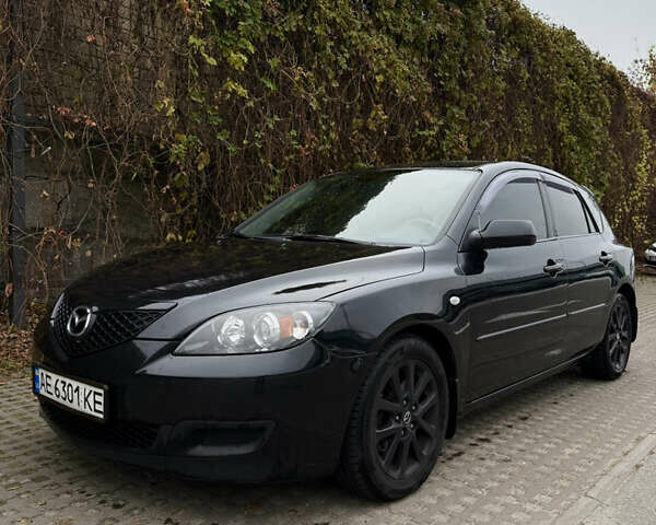 Черный Мазда 3, объемом двигателя 2 л и пробегом 274 тыс. км за 6800 $, фото 4 на Automoto.ua