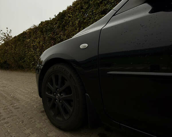 Черный Мазда 3, объемом двигателя 2 л и пробегом 274 тыс. км за 6800 $, фото 32 на Automoto.ua