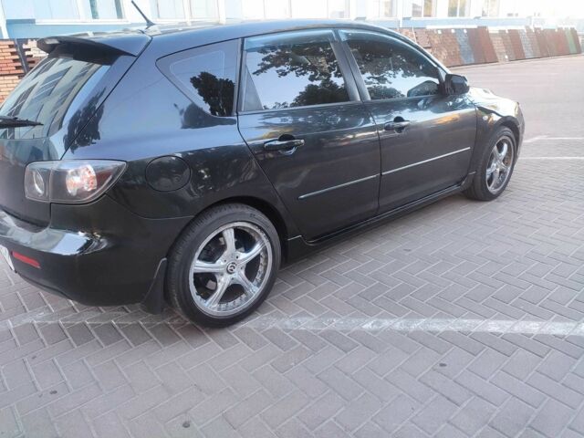 Черный Мазда 3, объемом двигателя 2 л и пробегом 298 тыс. км за 4600 $, фото 3 на Automoto.ua