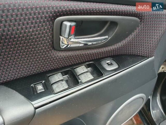 Черный Мазда 3, объемом двигателя 1.6 л и пробегом 264 тыс. км за 5700 $, фото 24 на Automoto.ua