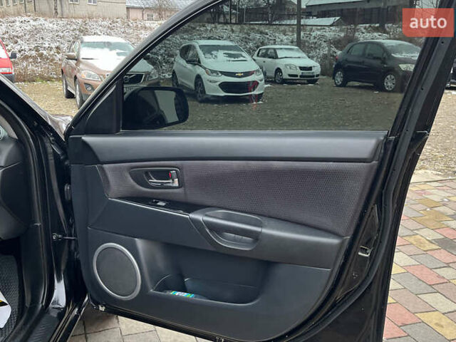 Черный Мазда 3, объемом двигателя 1.6 л и пробегом 265 тыс. км за 5999 $, фото 19 на Automoto.ua