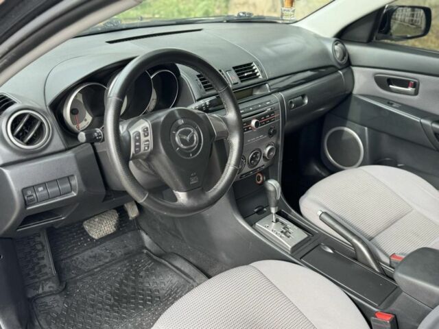 Черный Мазда 3, объемом двигателя 1.6 л и пробегом 215 тыс. км за 5850 $, фото 7 на Automoto.ua