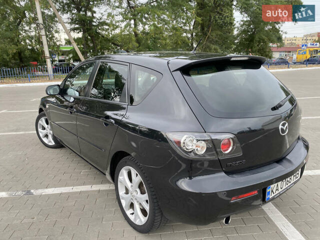 Черный Мазда 3, объемом двигателя 2 л и пробегом 200 тыс. км за 5750 $, фото 6 на Automoto.ua