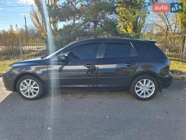 Черный Мазда 3, объемом двигателя 2 л и пробегом 198 тыс. км за 6200 $, фото 13 на Automoto.ua