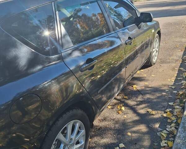 Черный Мазда 3, объемом двигателя 2 л и пробегом 198 тыс. км за 6200 $, фото 19 на Automoto.ua