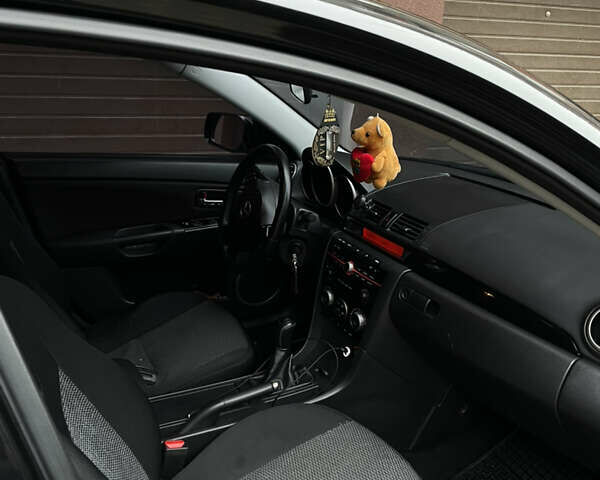 Черный Мазда 3, объемом двигателя 1.6 л и пробегом 210 тыс. км за 5200 $, фото 12 на Automoto.ua