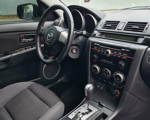 Черный Мазда 3, объемом двигателя 1.6 л и пробегом 182 тыс. км за 5500 $, фото 26 на Automoto.ua