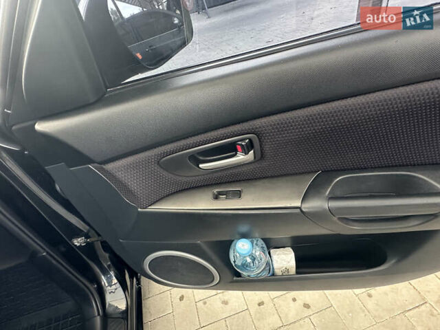 Чорний Мазда 3, об'ємом двигуна 1.6 л та пробігом 215 тис. км за 5500 $, фото 22 на Automoto.ua