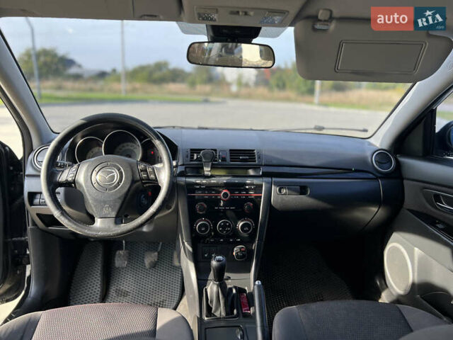 Чорний Мазда 3, об'ємом двигуна 2 л та пробігом 288 тис. км за 5500 $, фото 5 на Automoto.ua