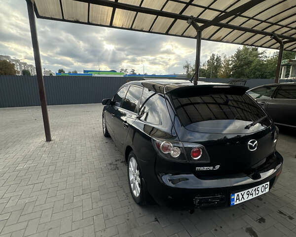 Чорний Мазда 3, об'ємом двигуна 1.6 л та пробігом 215 тис. км за 5500 $, фото 6 на Automoto.ua