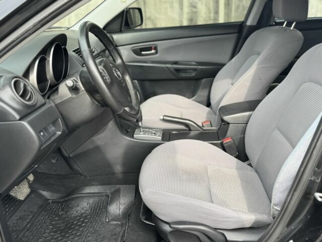 Черный Мазда 3, объемом двигателя 1.6 л и пробегом 215 тыс. км за 5850 $, фото 5 на Automoto.ua