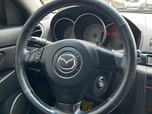 Черный Мазда 3, объемом двигателя 1.6 л и пробегом 265 тыс. км за 5800 $, фото 11 на Automoto.ua